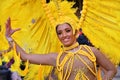 TORREVIEJA, SPAIN FEBRUARY 12, 2023: Participants dressed in a colorful carnival costumes on the street during the traditional