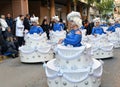 TORREVIEJA, SPAIN FEBRUARY 12, 2023: Participants dressed in a colorful carnival costumes on the street during the traditional