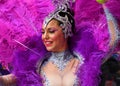 TORREVIEJA, SPAIN FEBRUARY 12, 2023: Participants dressed in a colorful carnival costumes on the street during the traditional