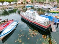 Torri Del Benaco, Italy - September 20, 2014: Fishing boats in the small harbor Royalty Free Stock Photo