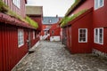 TORSHAVN, FAROE ISLANDS - JULY 05, 2019: Old town of capital city of Torshavn. Typical houses with peat roof grass roof .