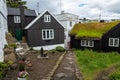 TORSHAVN, FAROE ISLANDS - JULY 05, 2019: Old town of capital city of Torshavn. Typical houses with peat roof grass roof .