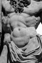 Torso (body) of antique god Hercules (Heracles) as symbol of power and strength