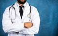 Torso of a confident doctor with stethoscope Royalty Free Stock Photo