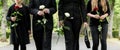 Torso of family on cemetery mourning Royalty Free Stock Photo