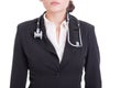 Torso of young suited woman doctor or medic wearing stethoscope Royalty Free Stock Photo