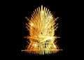 Hand drawn golden iron throne of Westeros made of antique swords or metal blades. Ceremonial chair built of weapon isolated