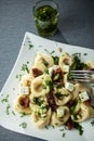 Tortellini pasta, basil pesto and feta cheese