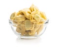 Tortellini pasta in glass bowl. Italian stuffed pasta