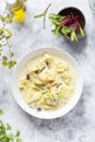 Tortellini pasta soup with spinach, carrot and chicken Royalty Free Stock Photo