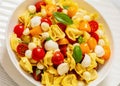 tortellini salad with tomatoes, mozzarella in bowl Royalty Free Stock Photo