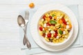 tortellini salad with tomatoes, mozzarella in bowl Royalty Free Stock Photo