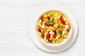 tortellini salad with tomatoes, mozzarella in bowl Royalty Free Stock Photo