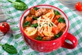 Tortellini soup with italian sausages, spinach, tomato, parmesan cheese Royalty Free Stock Photo