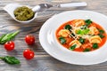 Tortellini soup with italian sausages, spinach, tomato, parmesan cheese , pesto-sauce Royalty Free Stock Photo