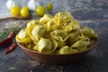 Tortelloni pasta, italian traditional pasta with meat or vegetables. Hommemade food, cooking process Royalty Free Stock Photo