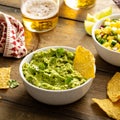 Tortilla chips with dips, guacamole and salsa Royalty Free Stock Photo