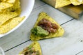 Tortilla chips with guacamole and salsa dips Royalty Free Stock Photo