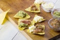 Tortilla chips with guacamole and salsa dips Royalty Free Stock Photo