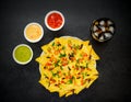 Tortilla Chips with Guacamole, Tomato and Cheese Dip and Cola Royalty Free Stock Photo