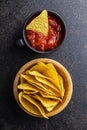 Tortilla chips and red tomato salsa dip. Mexican nacho chips Royalty Free Stock Photo