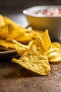 Tortilla chips and red tomato salsa dip. Mexican nacho chips Royalty Free Stock Photo