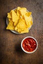 Tortilla chips and red tomato salsa dip. Mexican nacho chips Royalty Free Stock Photo