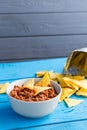 Tortilla Cips In Homemade Tomato Sauce (Ketchup) On Blue Wooden Table Royalty Free Stock Photo