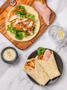 Tortilla ham and chicken sandwich wrap Royalty Free Stock Photo