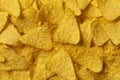 Tortilla Nacho Cheese Chips close up full frame as background