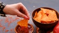 Tortilla nacho chip food snack hand dip sauce
