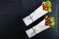 Sandwich wraps with fried chicken meats and salad Royalty Free Stock Photo