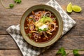 Tortilla soup with avocado and cheese. Mexican food Royalty Free Stock Photo