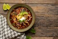 Tortilla soup with avocado and cheese. Mexican food Royalty Free Stock Photo