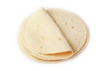 Tortilla on a white isolated background. Corn tortilla or simply tortilla is a type of thin unleavened bread made from Hominy