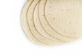 Tortilla on a white isolated background. Corn tortilla or simply tortilla is a type of thin unleavened bread made from Hominy