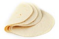 Tortilla on a white isolated background. Corn tortilla or simply tortilla is a type of thin unleavened bread made from Hominy