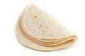 Tortilla on a white isolated background. Corn tortilla or simply tortilla is a type of thin unleavened bread made from