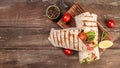 Tortilla wrap with asparagus, cherry tomatoes, avocado, chicken fillet and fresh salad. healthy food. Top view. banner, menu Royalty Free Stock Photo