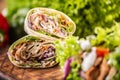Tortilla wraps with meat, vegetables, mayonnaise with a salad on the side Royalty Free Stock Photo