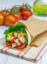 Tortilla wraps with roasted chicken fillet, fresh vegetables and sauce