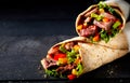 Tortilla wraps with tender entrecote beef steak Royalty Free Stock Photo