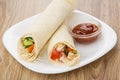 Tortillas with chicken meat, vegetables and ketchup in plate Royalty Free Stock Photo