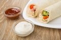 Tortillas with chicken meat and vegetables in plate Royalty Free Stock Photo