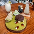 Tortoise cake served with cantaloupe