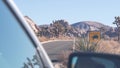 Tortoise or turtle crossing yellow road sign, California USA. Wild animal xing. Royalty Free Stock Photo