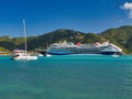 Tortola, BVI - Jan 23 2024: The Marella Voyager cruise ship moored at the Cyril B. Romney Tortola Pier, Road Town, Tortola, BVI. Royalty Free Stock Photo