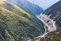 Tortuous mountain road in the green valley