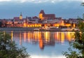 Torun. City embankment along the river at sunset.