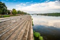 Torun, Poland - August 11, 2021. Panoramic view of Wisla river with river bank in sunset Royalty Free Stock Photo